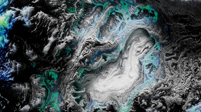 Edge-of-Chaos Fluid — a blue, green, black, and white fluid-field composition made with MotionCOPs